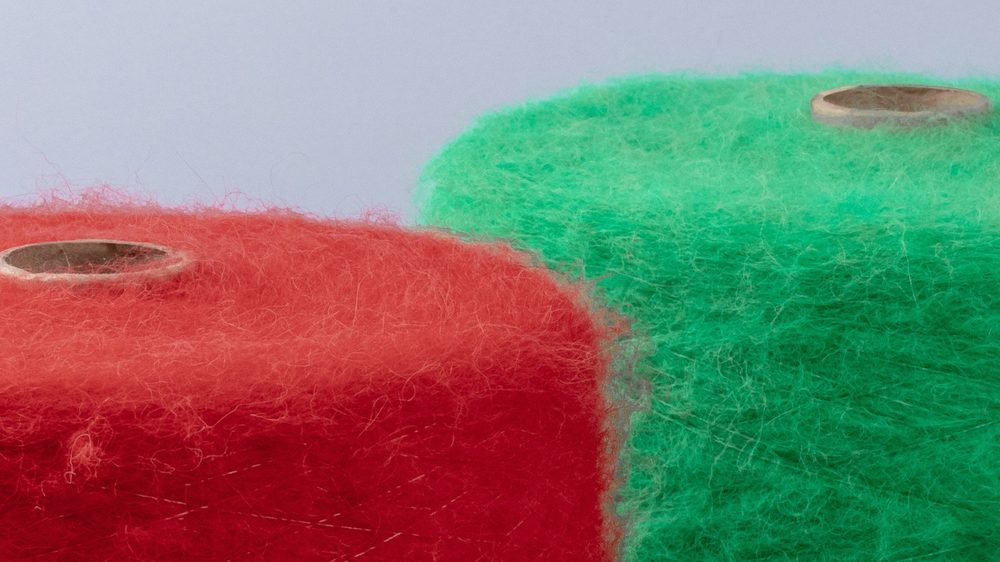 Recycled fibers in luxury yarns: why they contain polyamide and what your brand gains from it - recycled polyamide and circular economy
