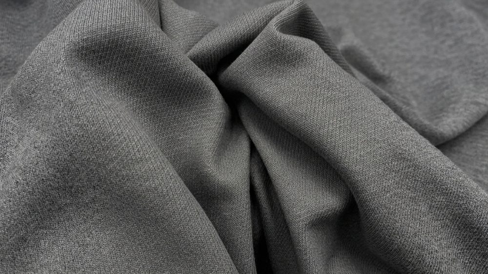 Recycled fibers in luxury yarns: why they contain polyamide and what your brand gains from it - what it does in a premium yarn